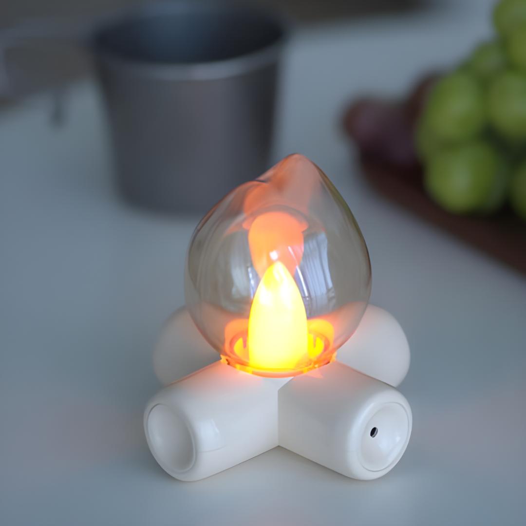 lampe flamme posée sur un comptoir blanc