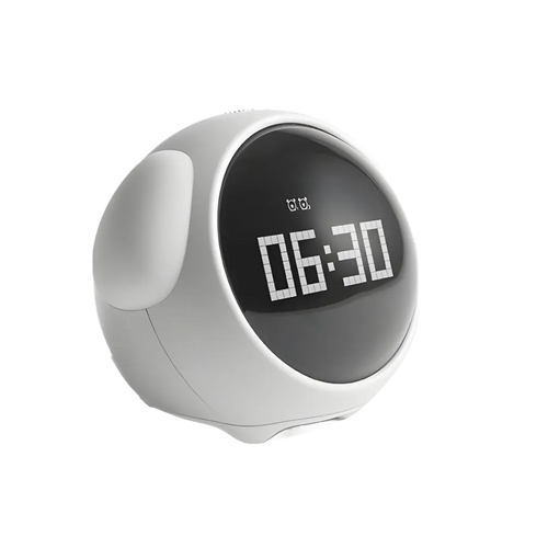 Réveil digital blanc affichant l’heure 06:30, lumière éteinte