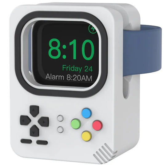 Support Apple Watch blanc en forme de console rétro avec boutons colorés, affichant l’heure.
