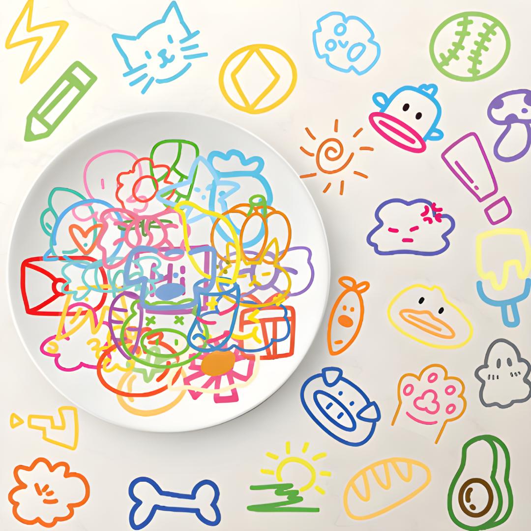 Lot de stickers déco autocollant colorés disposés autour d'une assiette blanche sur fond clair
