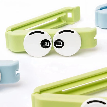 Clip vert pour sachet alimentaire avec double molette réglable intégrée