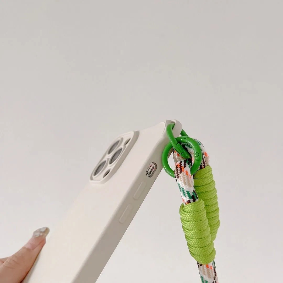 Vue latérale de la coque crème montrant le cordon tressé vert