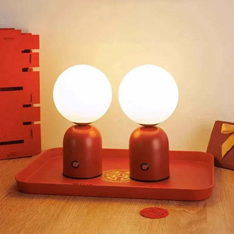 2 lampes tête ronde à poser couleur rouge