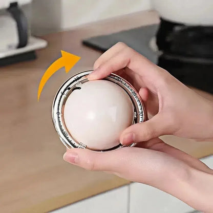 Réglage du minuteur sphérique manuel sur un plan de travail de cuisine
