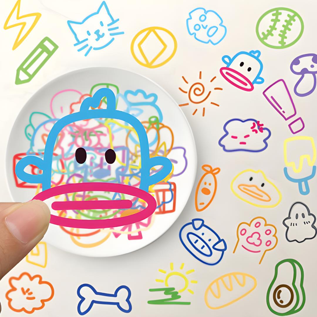 Stickers déco autocollant en forme de tête de singe tenu devant une assiette remplie de motifs