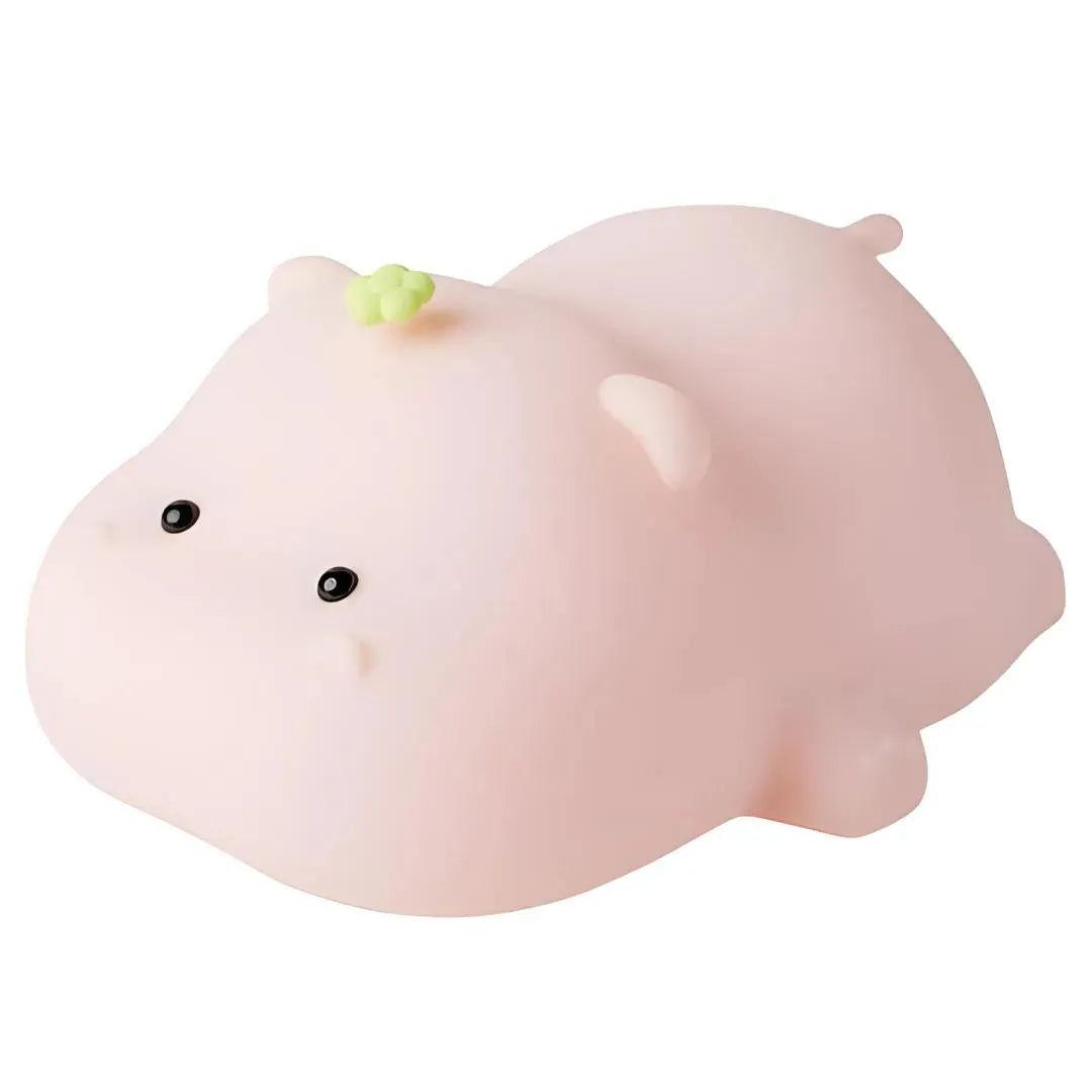 Veilleuse LED en forme d’hippopotame rose, sur fond blanc, idéale pour chambre enfant ou bébé